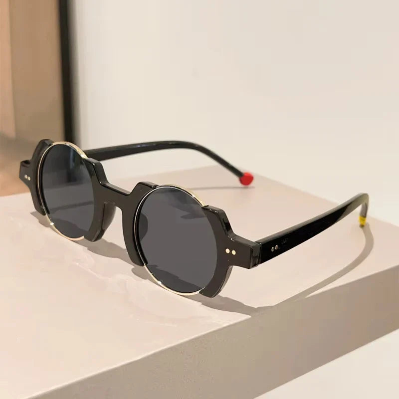 Stylish unisex round frame sunglasses with a futuristic design, offering excellent UV eye protection.