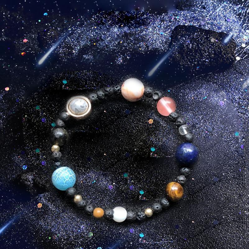 Unisex gemstone solar system bracelet featuring natural stone planets, a unique celestial fashion accessory.