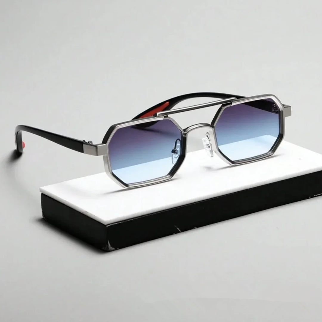 Modern unisex sunglasses featuring a unique geometric shape and two-tone frame design