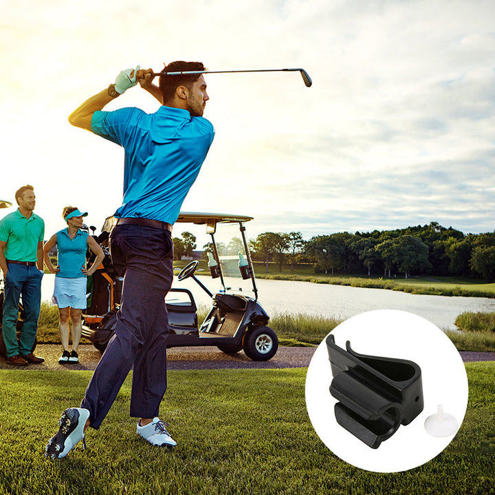 Golf putter clip & ball marker holder next to golf balls & tees. Practical golf tools for sports.