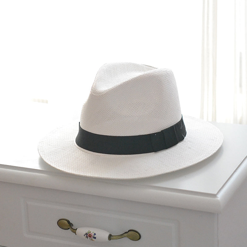 Close-up of a stylish Panama sun hat, hand-knitted for unisex wear & excellent UV protection.