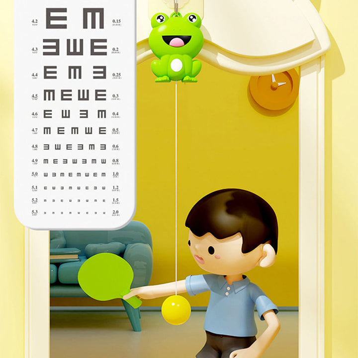 Kid enthusiastically playing with the Hanging Table Tennis Trainer, developing hand-eye coordination skills