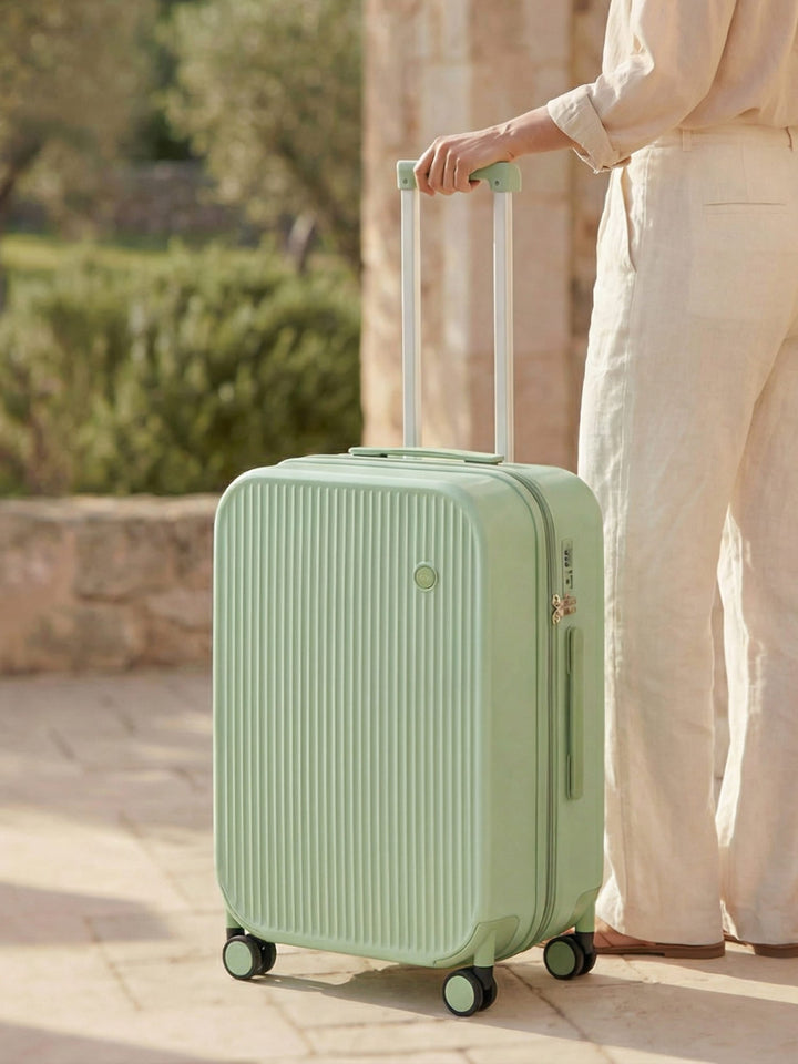 Convenient hard-shell spinner suitcase with integrated cup/phone holders. Perfect for organized business & vacation travel.