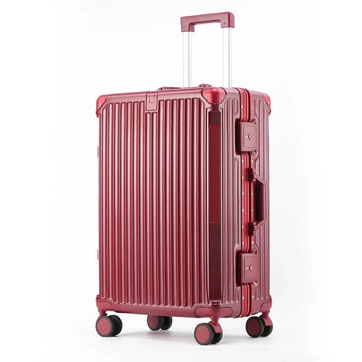 Modern hard-shell suitcase, cabin or checked, with lightweight aluminum frame and quiet spinner wheels.