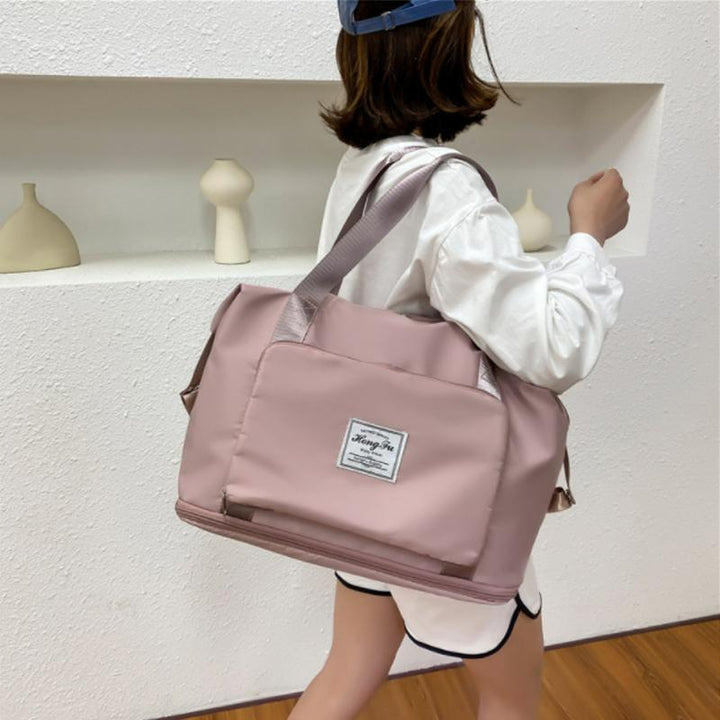 Spacious duffel bag with a dedicated compartment for wet items, ideal for sports