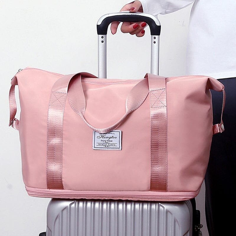 Foldable travel duffel bag in a navy blue, great for extra storage on the go