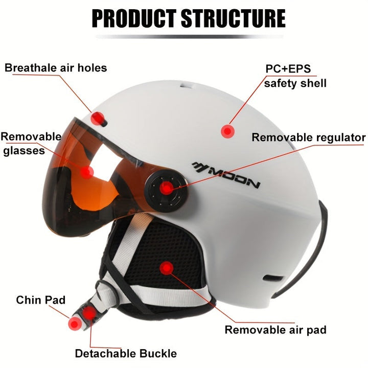 Black ski helmet with removable goggle strap, ensuring a secure fit for skiers & snowboarders.