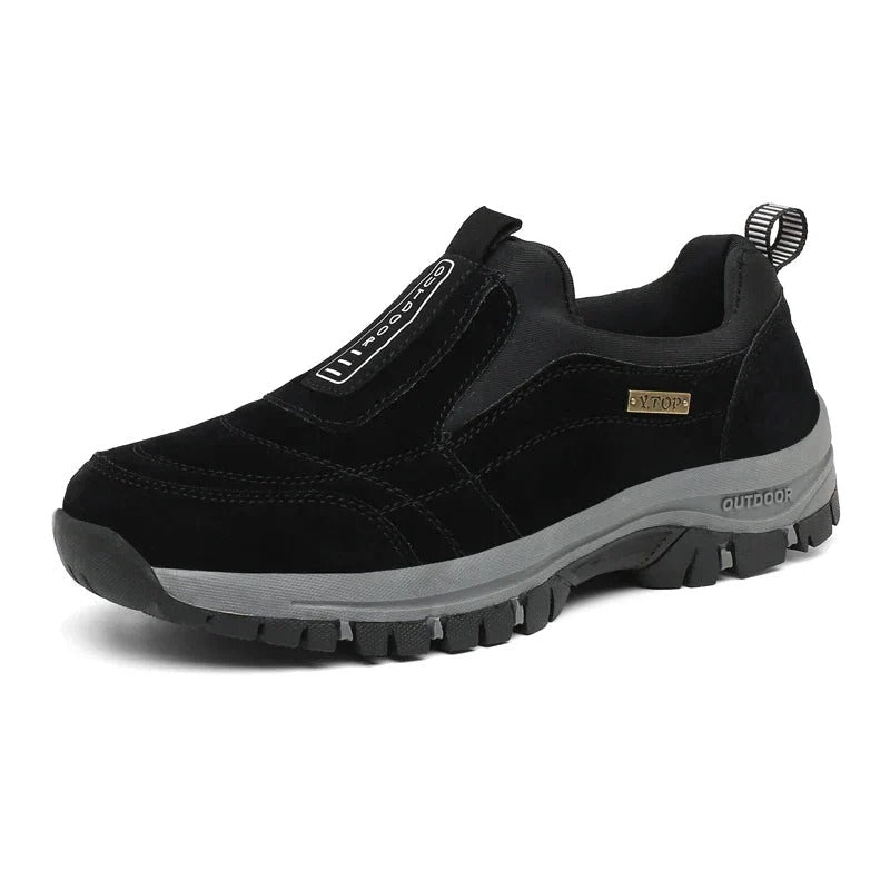 Comfortable unisex hiking footwear with orthopedic support, perfect for long walks & outdoor activities.