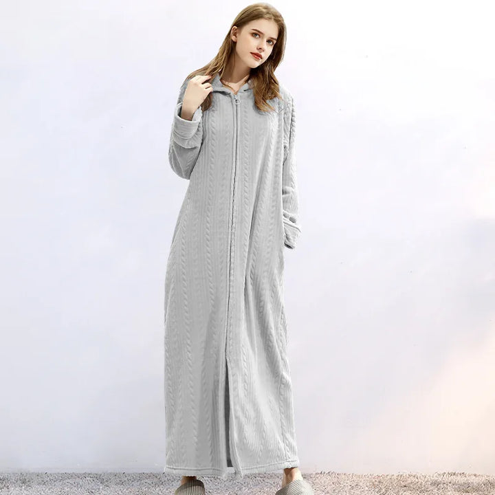 Cozy hooded unisex bathrobe, ideal for unwinding after a long day. Plush comfort.