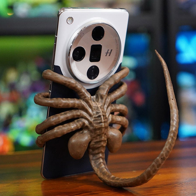 Close-up of the Horrible Creature Phone Holder Stand's detailed, monstrous resin face.