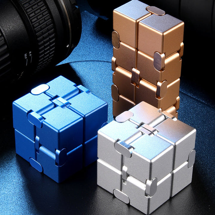 Metal Infinity Fidget Cube, a durable desk toy for stress relief and focus aid
