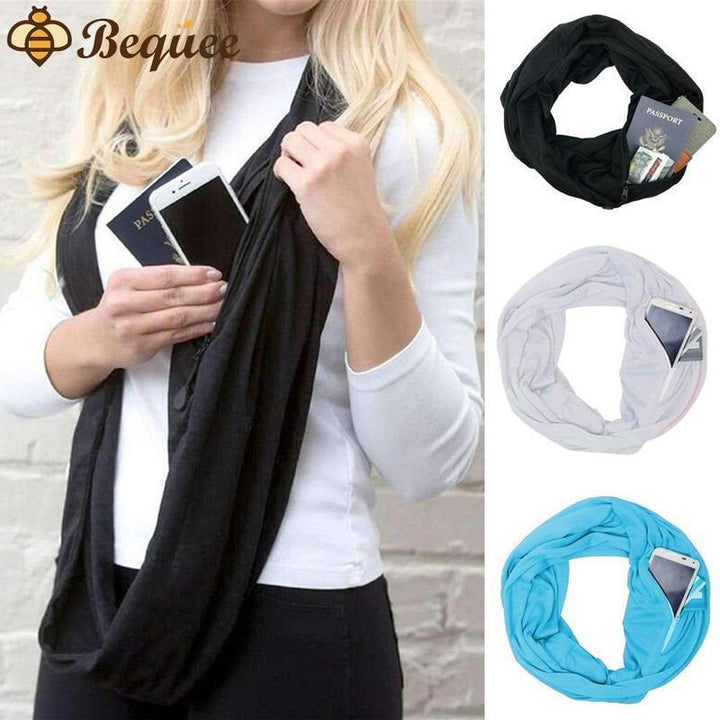 Unisex infinity scarf with hidden zipper pocket. Black with gold chain print.