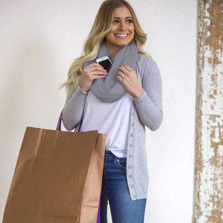 All-season polyester infinity scarf, a practical fashion accessory with hidden storage.