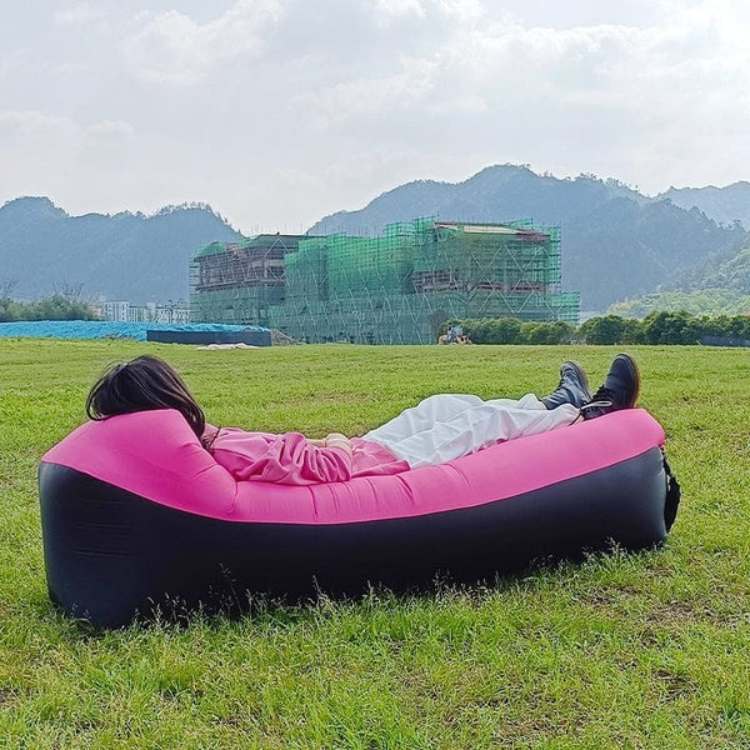 Quick-inflate, no-pump outdoor lounger. Portable sofa bed provides ergonomic support for relaxation.