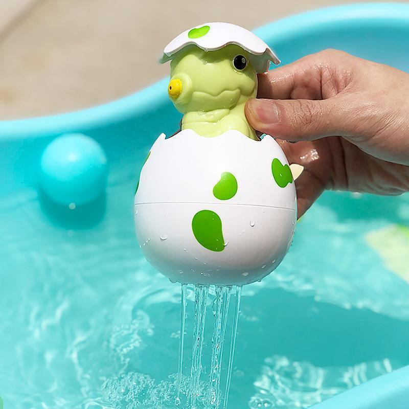 Child giggling with the water-spraying Floating Bath Sprinkler, an ideal bath toy gift for toddlers