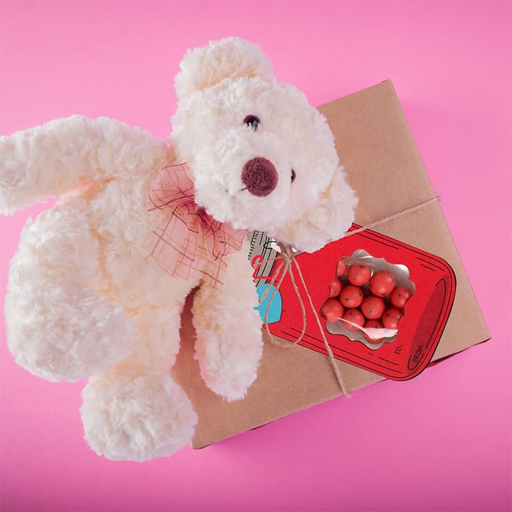 Assortment of colorful paper, embellishments & a mini jar for the craft kit