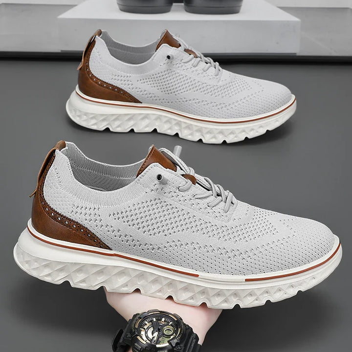 Stack of colorful unisex orthopedic knit sneakers, showcasing variety and comfortable footwear options