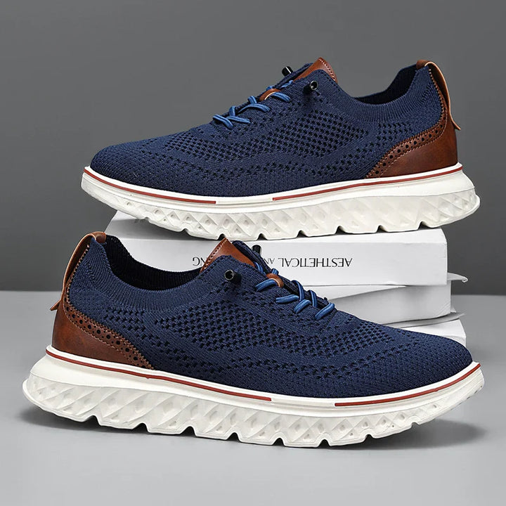 Bottom sole of cushioned knit sneakers, revealing non-slip tread for athletic and daily activities