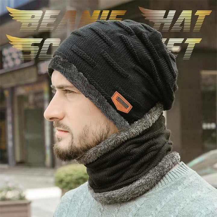 The knitted beanie and scarf set displayed on a wooden surface, ready as a thoughtful gift for winter warmth.