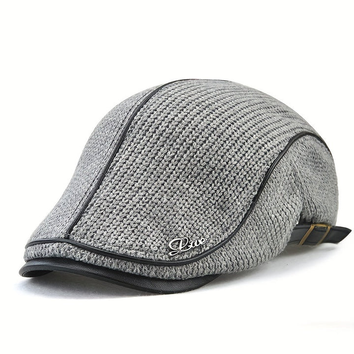 Warm knitted polyester beret, a cozy unisex winter hat. Stay stylish & comfortable in chilly fall weather.