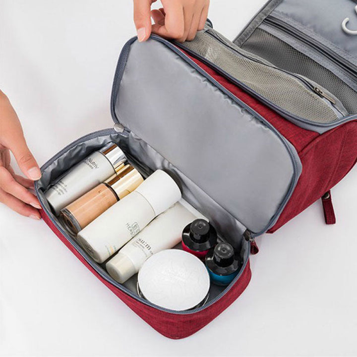 Practical large hanging toiletry bag, a multi-compartment travel organizer and luggage accessory.