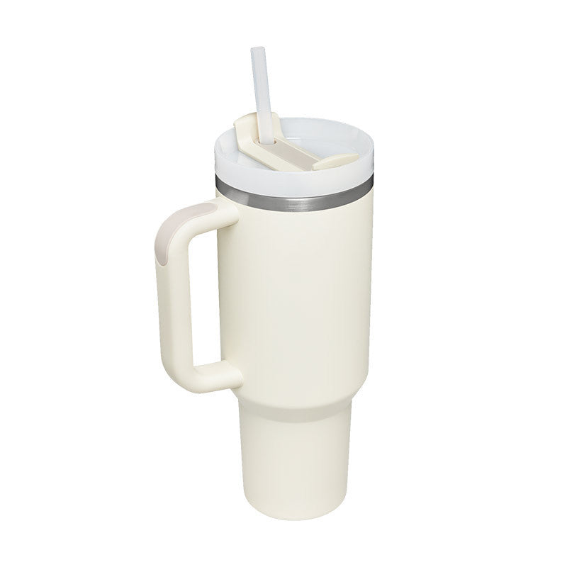 Travel-friendly insulated coffee tumbler with handle and included straw.