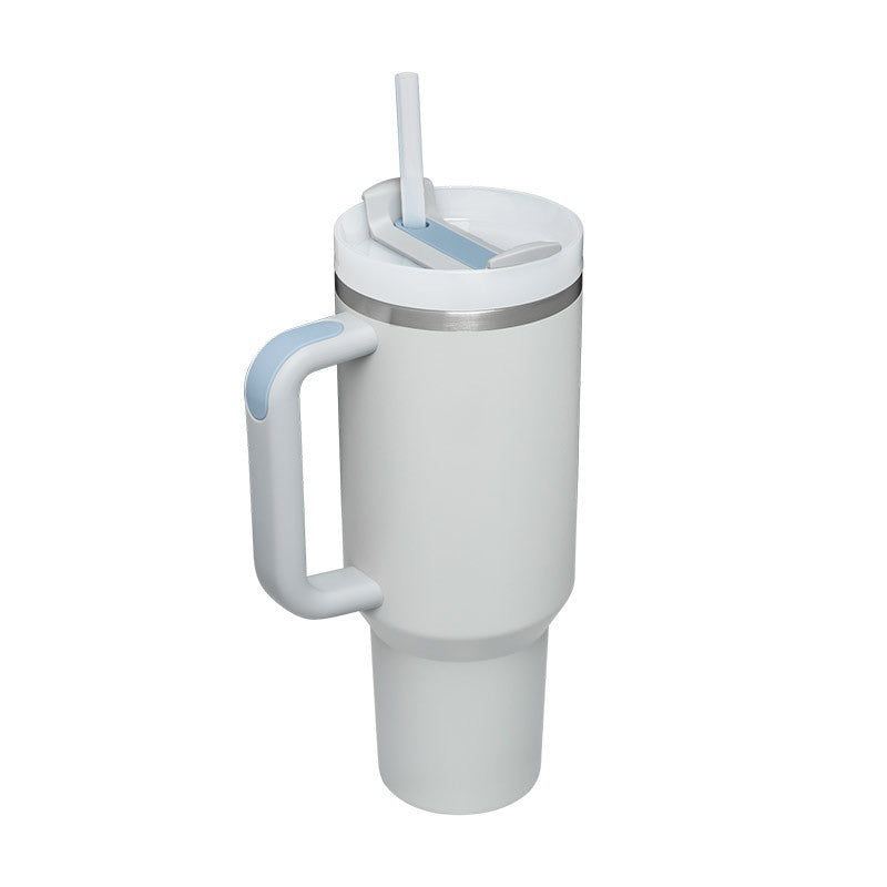 Stylish large insulated mug with handle & straw, suitable for any occasion.