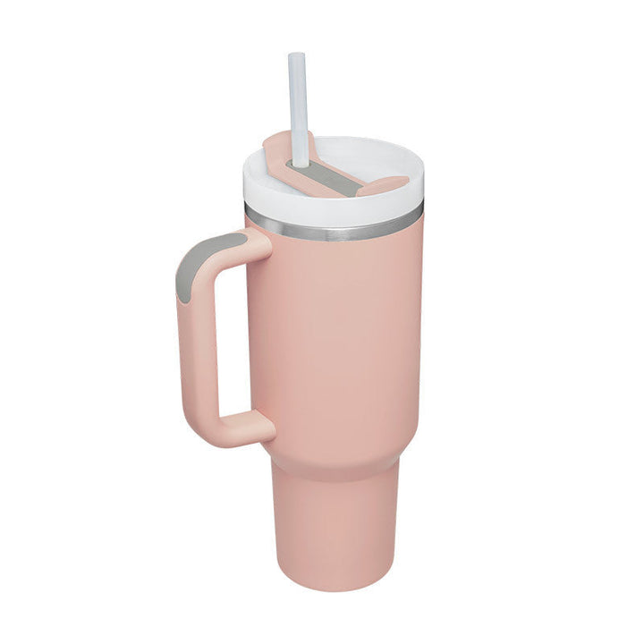 Portable insulated coffee tumbler with handle & straw, keeps drinks fresh.