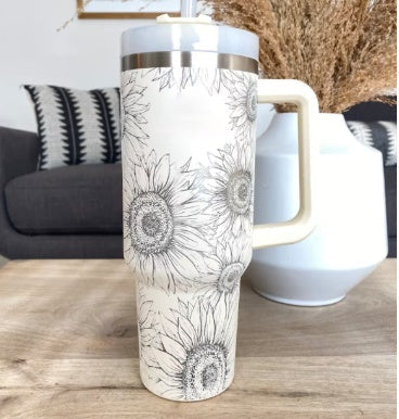 Versatile insulated mug with handle & straw, perfect for various beverages.