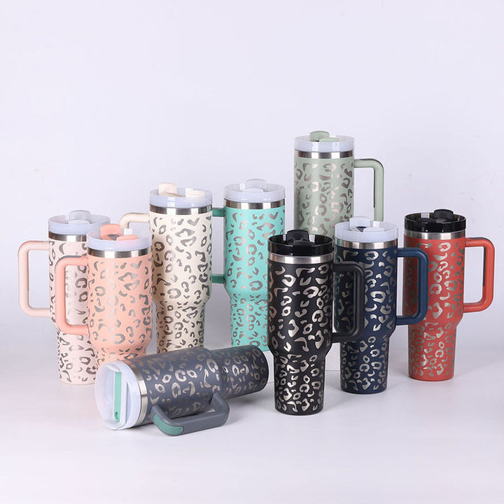 Handled insulated coffee tumbler, keeps drinks hot/cold, includes a straw.