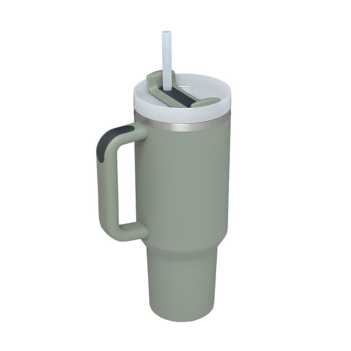 Reusable insulated mug with handle & straw, essential for daily hydration.