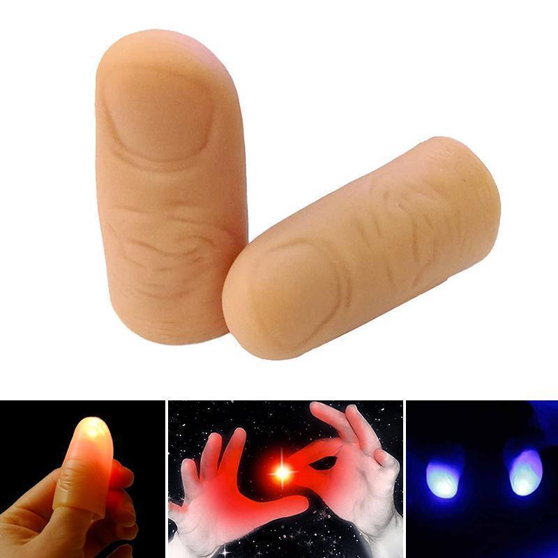 Unisex LED finger lights set creating a glowing illusion for a magic trick performance
