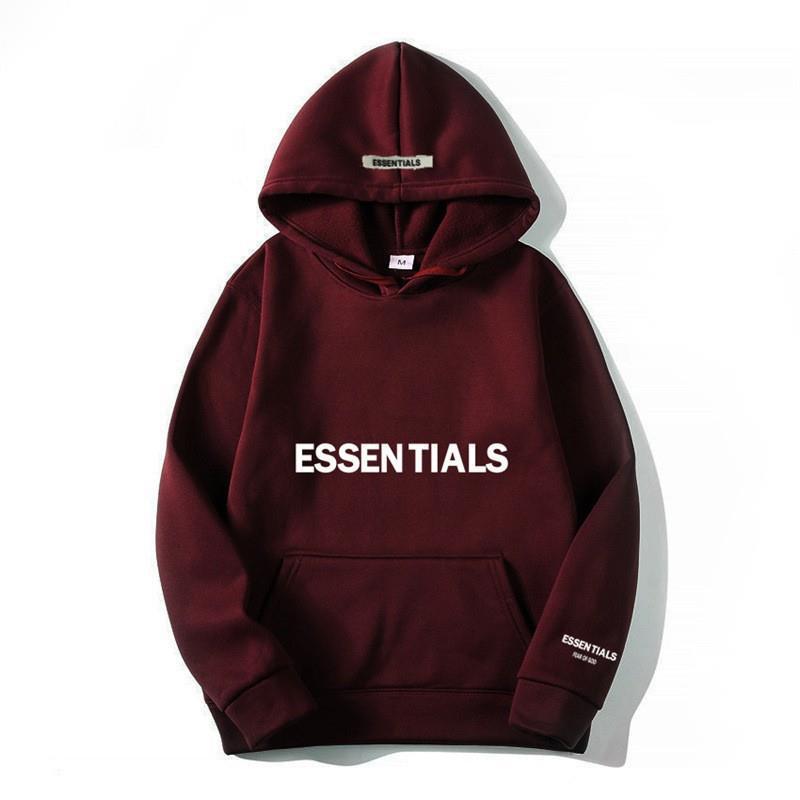 Minimalist letter print on a stylish unisex pullover hoodie, offering relaxed comfort for everyday.