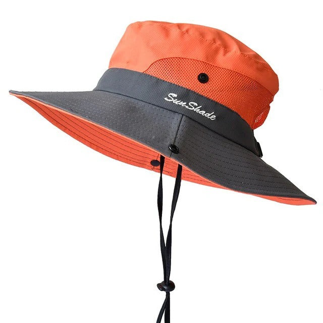 Breathable wide brim beach hat for women & men, offering UPF 50+ UV sun protection for summer travel.
