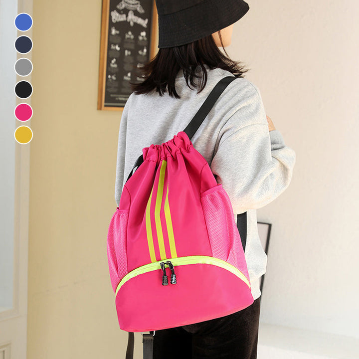 Unisex sports drawstring bag made of durable, lightweight black nylon, ideal for travel.