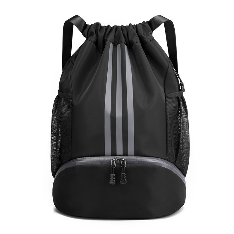 Folding black nylon drawstring backpack, a convenient and lightweight travel companion.
