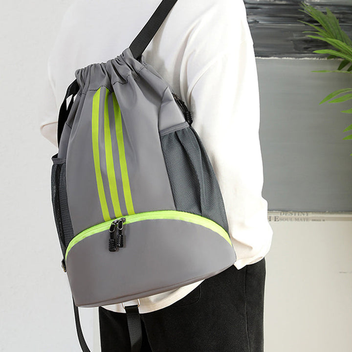 Compact black nylon drawstring backpack, a practical and lightweight travel accessory.