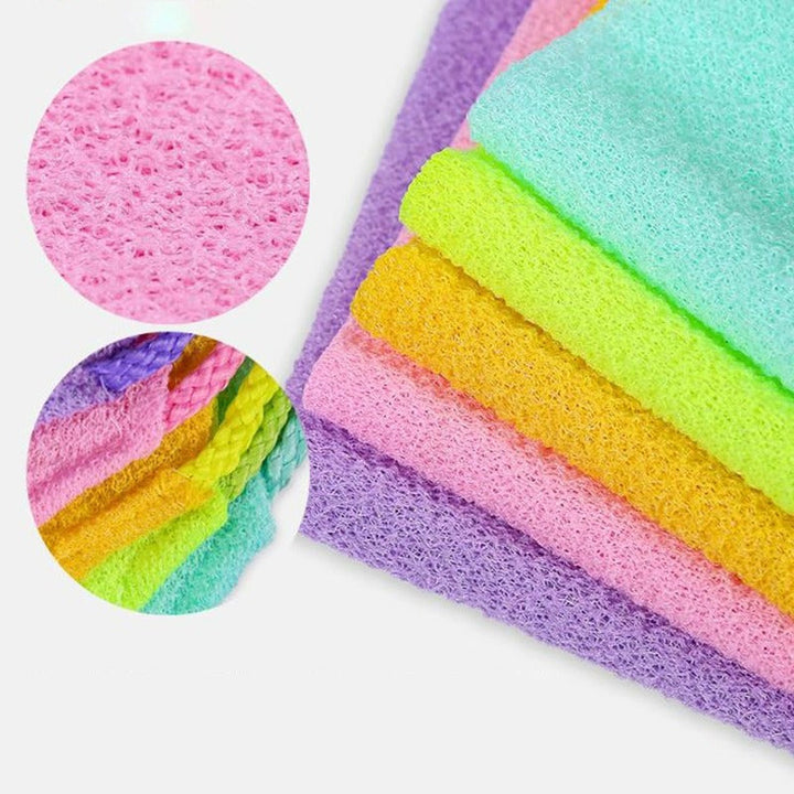 Exfoliating bath towel, unisex, shown stretching for full back reach, hygiene
