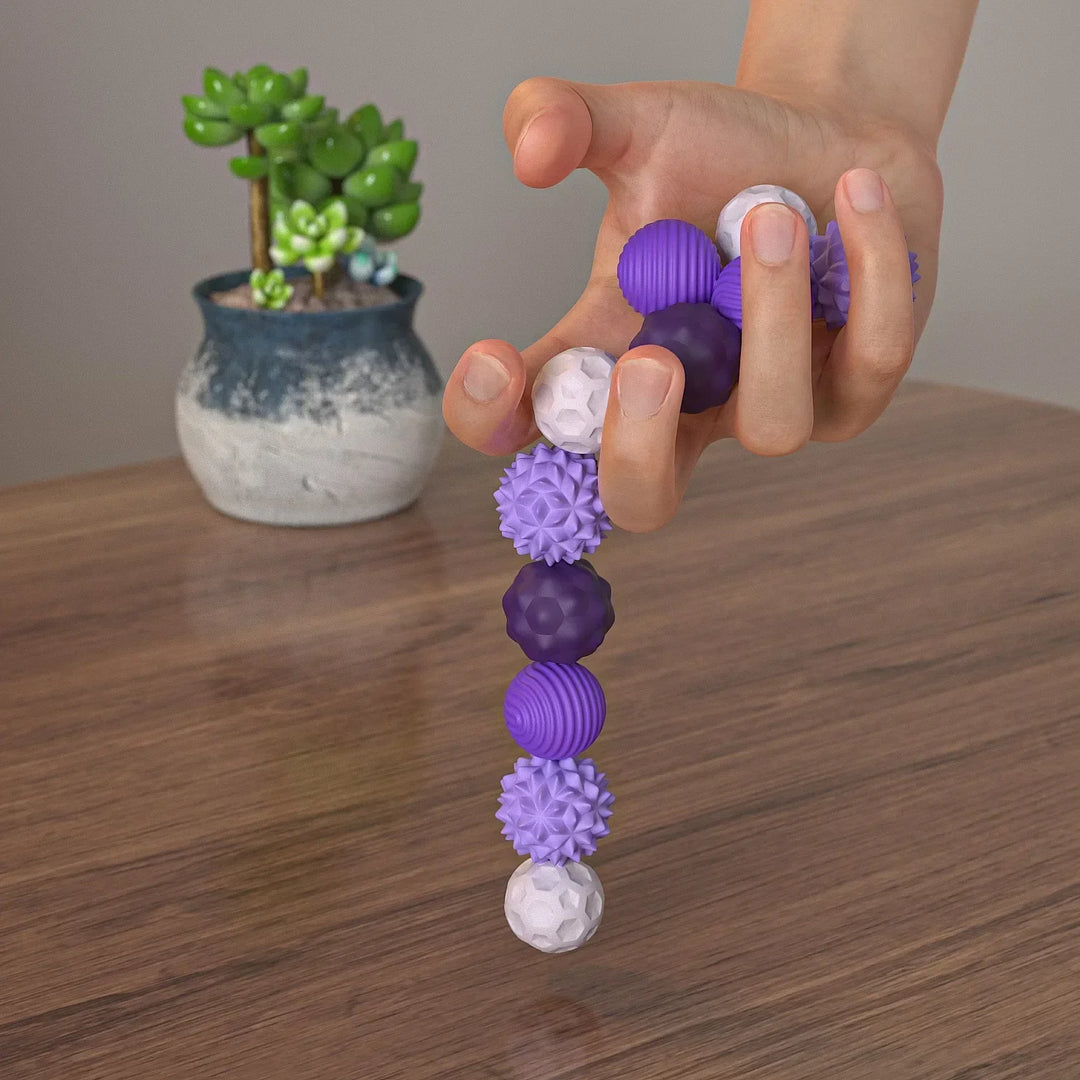 Sleek magnetic fidget set, CalmiSphere, designed for calm & focus. Ideal stress & anxiety relief for all.