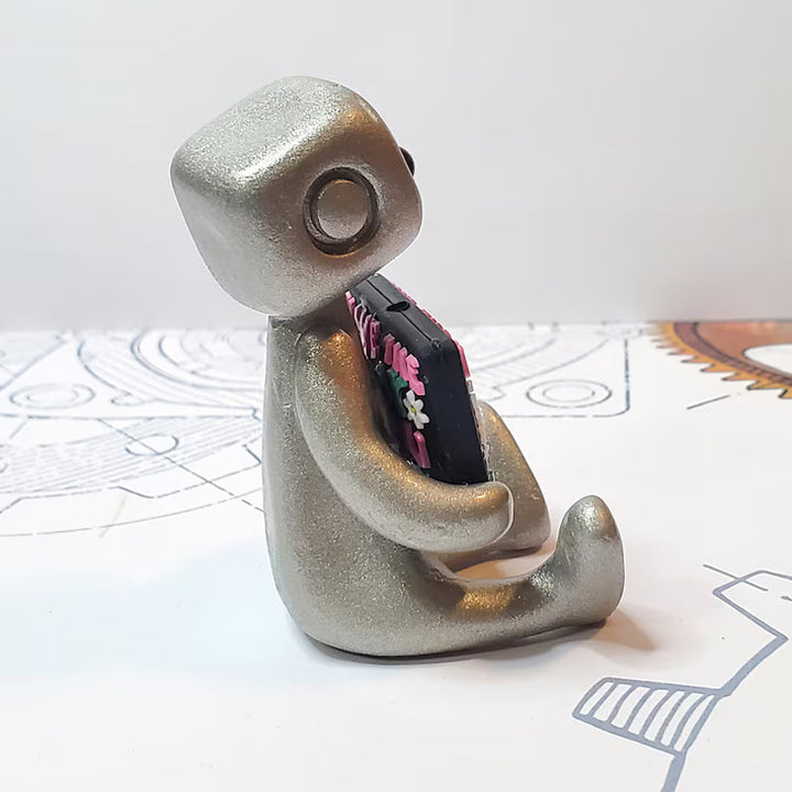 Wellness desk accessory, a durable resin robot companion for daily inspiration