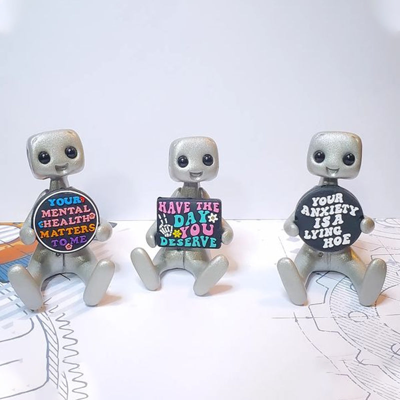 Resin robot desk companion, a decorative piece for mental health awareness