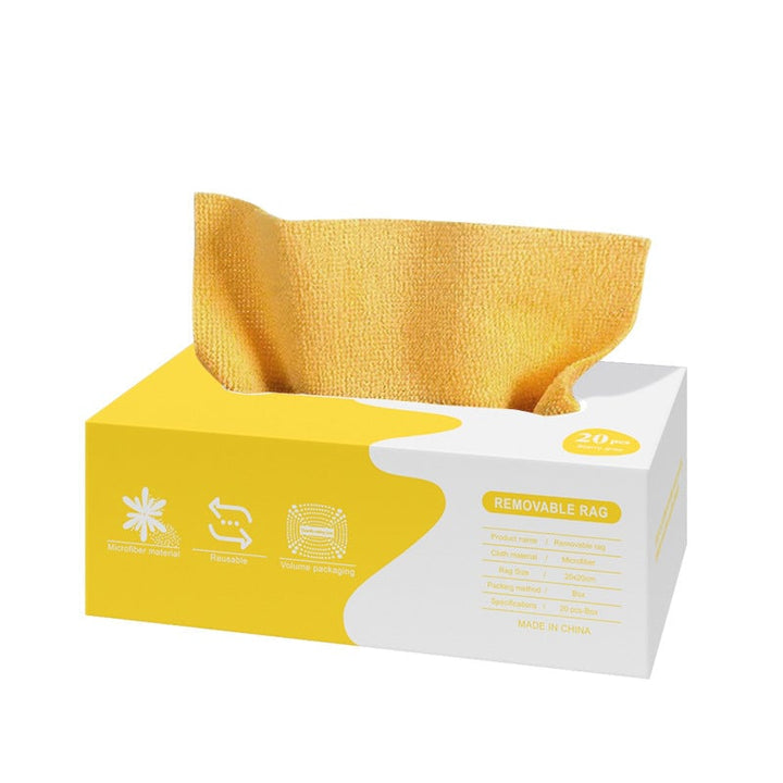 Microfiber cleaning cloth absorbing water from a puddle, ultra absorbent feature.