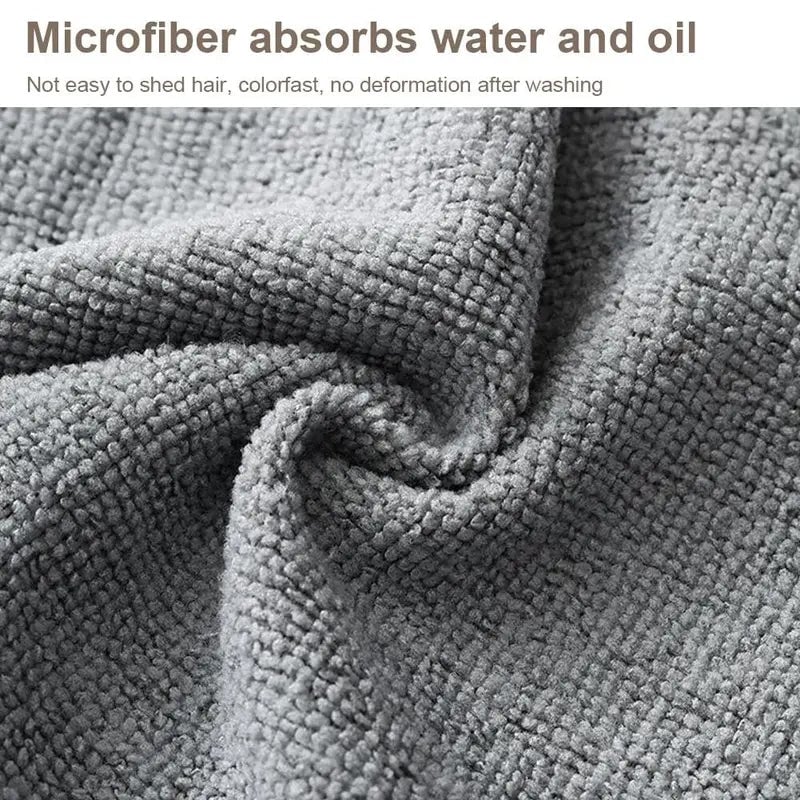 Wet microfiber cloth showing its high absorbency on a surface.