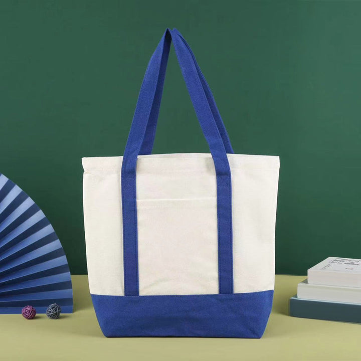 Eco-friendly reusable mini canvas tote bag, folded to show its travel-friendly portability