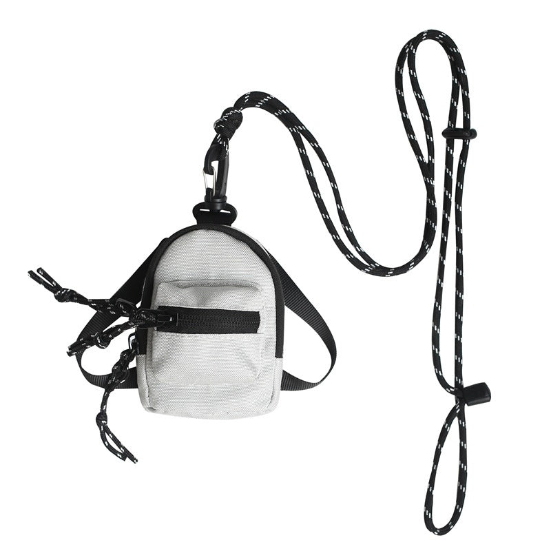 Durable and versatile mini bag for travel, made from premium oxford cloth.
