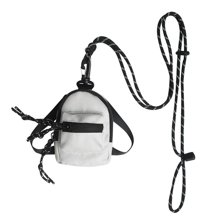Durable and versatile mini bag for travel, made from premium oxford cloth.