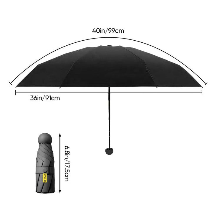 Detailed view of the ergonomic handle on the unisex mini travel umbrella, comfortable grip