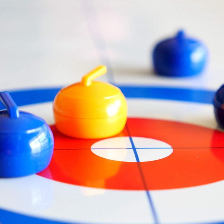 Tabletop curling game with a 47-inch mat and eight two-tone stones, designed for hours of party game fun.