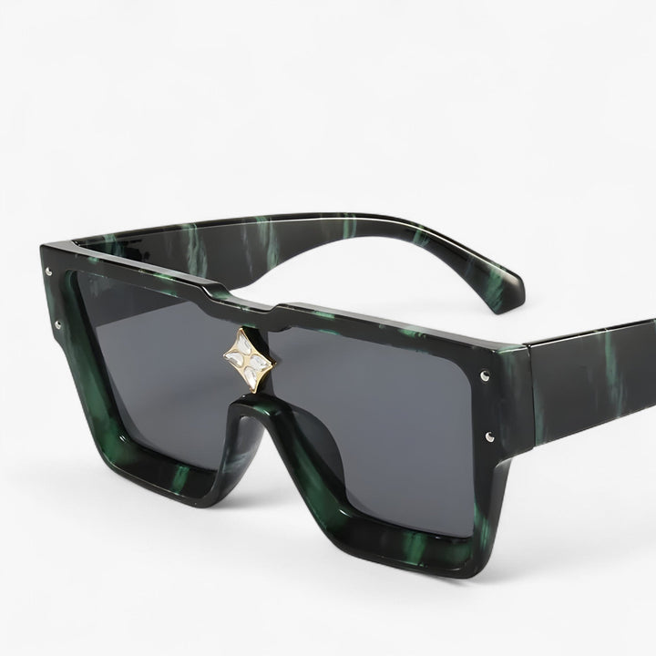 Statement unisex mirrored punk sunglasses with angular frames, embodying edgy and futuristic eyewear trends.