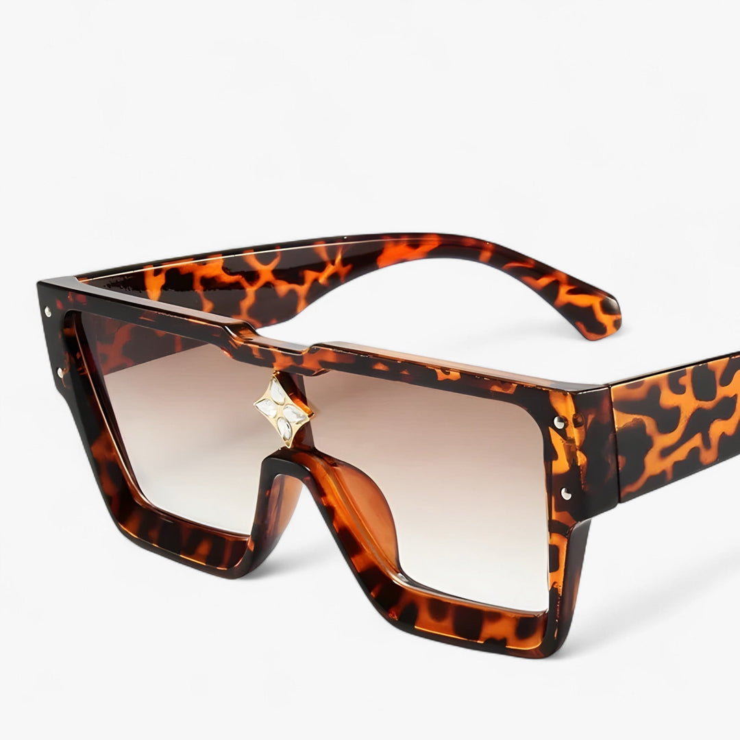 Futuristic unisex mirrored punk sunglasses. Edgy angular frames, perfect for street style and UV protection.
